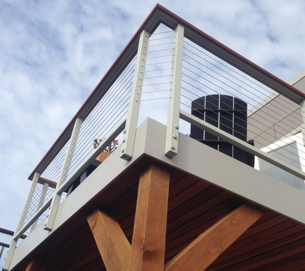 View looking up at deck of composite materials and cable railing